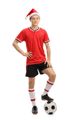 Poster - Teenage soccer player wearing a Christmas hat