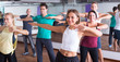 © JackF - Glad people learning zumba steps