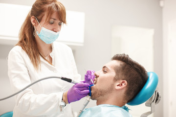 Wall Mural - Young Man At The Dentist