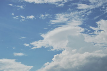 cloudy floating on bright sky in sunny day