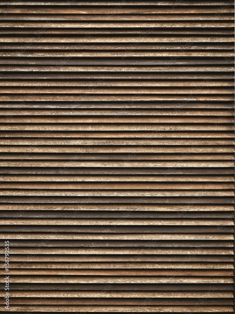 Vertical old wood plank wall texture background. Modern wall for interior and exterior design.
