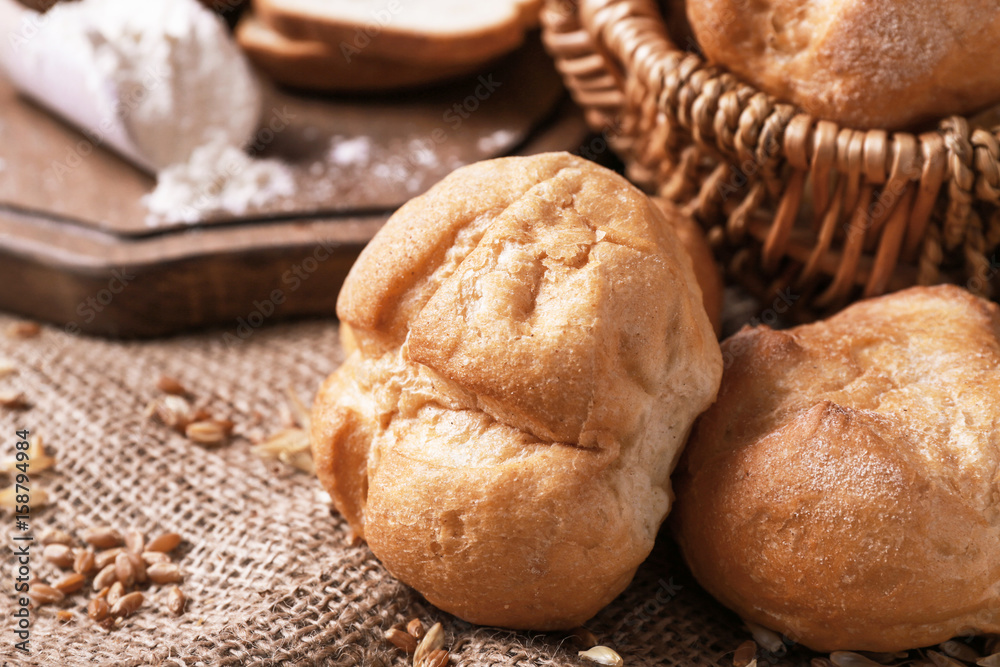Delicious loaves on sackcloth, closeup