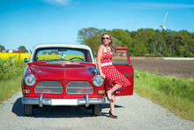 Summer Portrait Of Woman With Swedish Retro Car