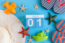 July 1st. Image Of July 1 Calendar With Summer Beach Accessories And Traveler Outfit On Background. Summer Day, Vacation Concept