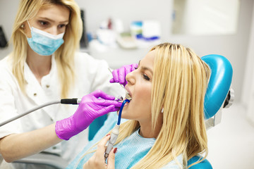 Wall Mural - Young Woman At The Dentist