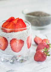 Canvas Print - Chia seed puddings with strawberry slices