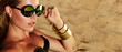 © EkaterinaJurkova - Beautiful young tanned healthy girl in bikini lies on the beach. Bright sun, summer, heat, rest. Accessories - sunglasses, gold bracelets. Beach, sand, rest, travel. Beautiful tanned skin.