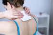 © RFBSIP - Woman applying heat patch