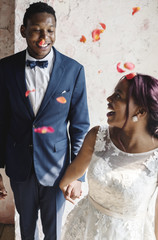 Wall Mural - Cheerful African Descent Bride Groom Together