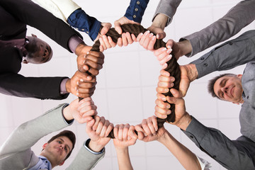 Wall Mural - Businesspeople Holding The Rope Together