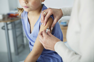 Wall Mural - Vaccinating a child