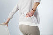 Lower back pain in elderly person