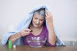 © RFBSIP - Senior woman preparing inhalation with essential oil