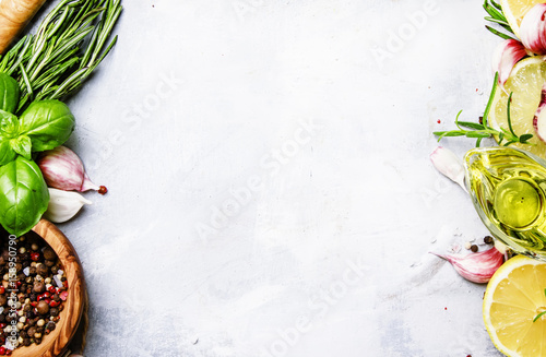 Fényképezés  Food background, spices, herbs, olive oil and seasonings, top view