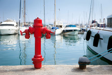 Marine Fire Hydrant On The Quay In Front Of The Yachts