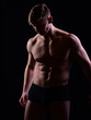© Volodymyr - macho, muscular man with bare torso, six pack in underwear