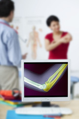 Wall Mural - Models On screen, colorized x-ray of the elbow (without pathology)