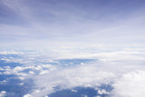 Fototapeta Niebo - Cloudy sky from window airplane view. Nature and abstract background.