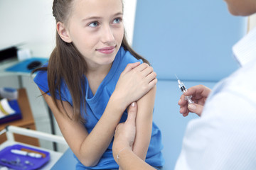 Wall Mural - Vaccinating a child