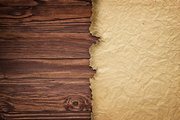 Wall Mural - ancient manuscript against the background of wooden boards