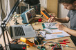 © Lumina/Stocksy - Student of Electronics Testing Equipment