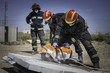 © brutale - Firefighter practicing with a disc cutter