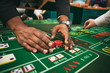© Sean Locke/Stocksy - Casino Man Wins On Craps Table