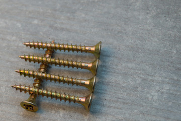 Screws in a row on a chair