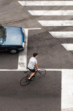Urban Cyclist Vs Car On CrosswalkLook From Above