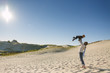 © Raymond Forbes LLC/Stocksy - Mother and Son at Provincetown Dunes Cape Cod