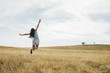 © Lumina/Stocksy - Young Woman Jumping Outdoors