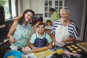 Wall Mural - Family preparing dessert in kitchen