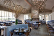 © Trinette Reed/Stocksy - Interiors of luxury upscale restaurant