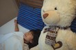 © wavebreak3 - Girl sleeping on bed in bedroom