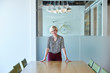 © Trinette Reed/Stocksy - Portrait of millennial businesswoman at tech start up office