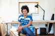 © Trinette Reed/Stocksy - Portrait of African American woman in her work studio