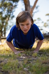 Wall Mural - girl exercising during obstacle course training
