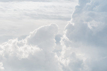 white sky and puffy cloud.
