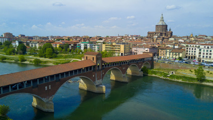 Wall Mural - Aerial video shooting with drone on Pavia, famous Lombardia city near the Ticino river in northern Italy