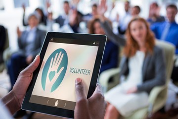 Poster - Composite image of volunteer text with icons on screen