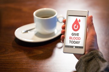 Poster - Composite image of give blood today text with icons on screen