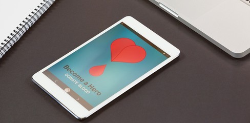 Poster - Composite image of become a hero text with heart shape on screen