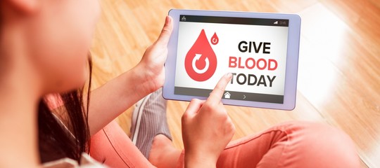 Poster - Composite image of give blood today text with icons on screen