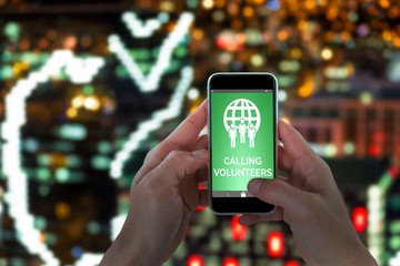 Poster - Composite image of close-up of man holding smart phone