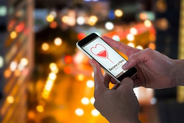 Poster - Composite image of close-up of man holding smart phone
