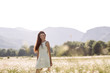 © boykovi1991 - Woman enjoying a field of daisies, beautiful woman lying in a meadow of flowers, beautiful girl relaxing outdoors, having fun, holding plant, happy young lady and spring-green nature, harmony concept.