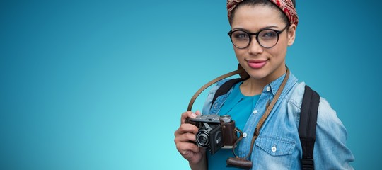 Poster - Composite image of portrait of female photographer with camera