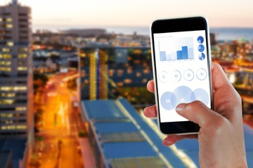 Poster - Composite image of cropped image of hand holding smart phone