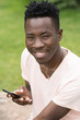© antgor - African american man using his cell phone