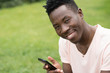 © antgor - African american man using his cell phone